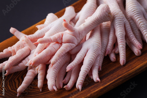 chicken paw on dark background