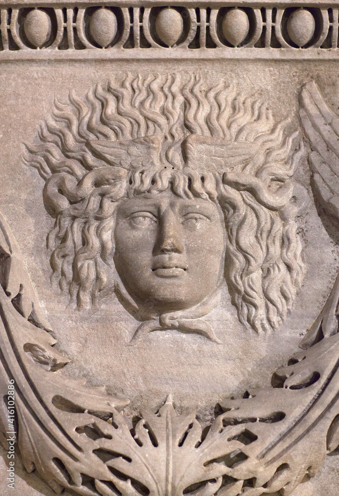 Ancient bas-relief of Medusa Gorgon head on marble sarcophagus from Tripoli, Roman period