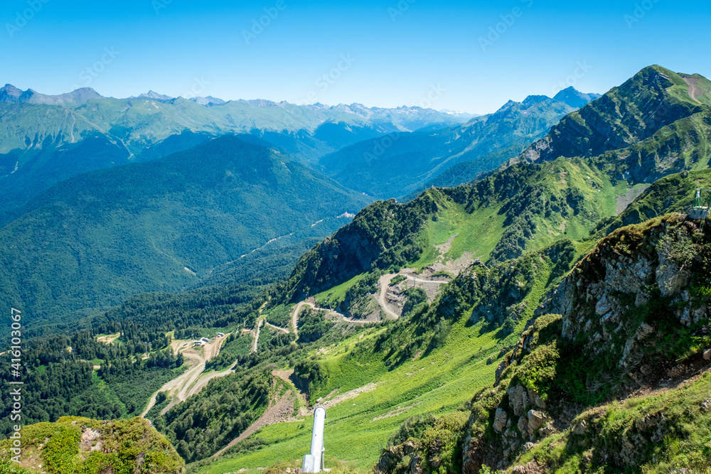 Naklejka premium Summer landscapes of the Caucasus mountains in Rosa Khutor, Russia, Sochi, Krasnaya Polyana. Peak 2320m