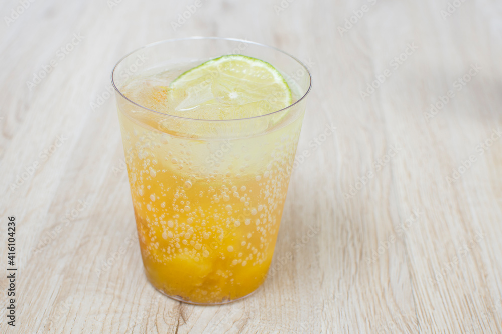 italian flavored sodas with ice and tropical flavors on white wooden background italian flavored sodas with ice and tropical flavors on white wooden background