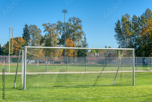 Wallpaper Mural Empty football gate on blue sky background Torontodigital.ca