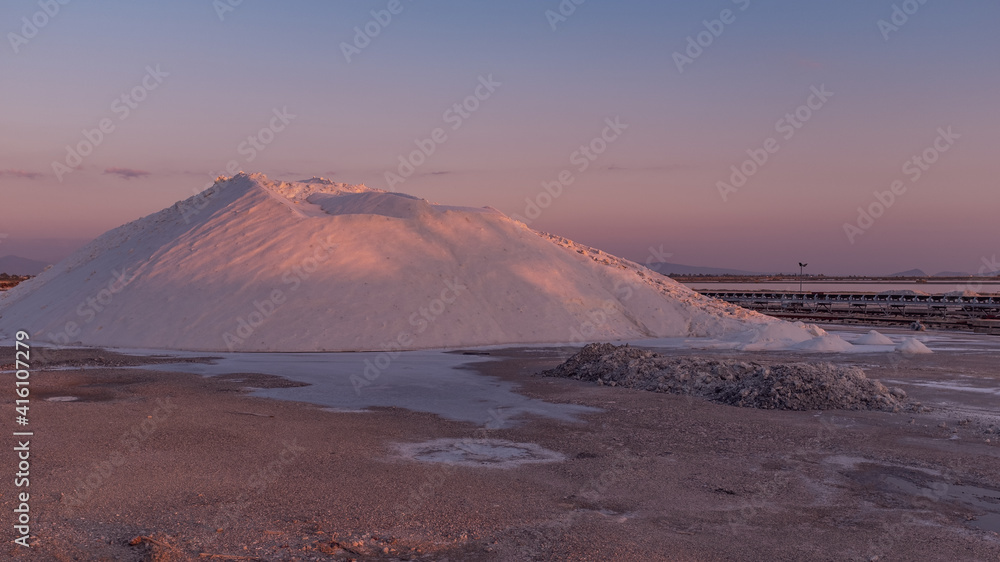 sunset over a mountain of salt