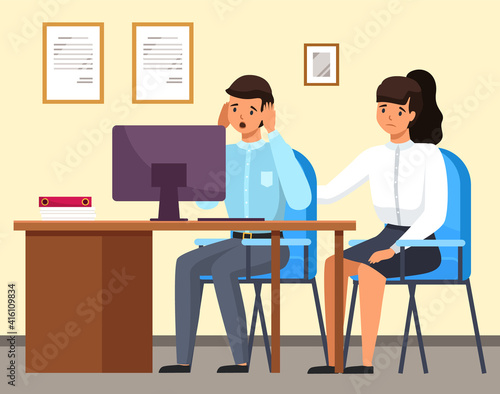 Man and woman sitting at a table with computer upset business people in sad feeling and emotional concept. A colleague consoles a frustrated employee. Problems at work and in career, staff reduction