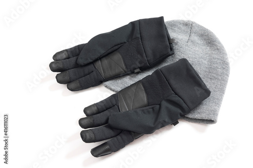 Grey knitted mens hat and gloves isolated on a white background. 