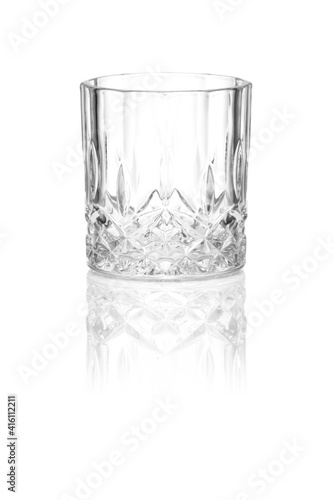 The empty glass on white background whiskey