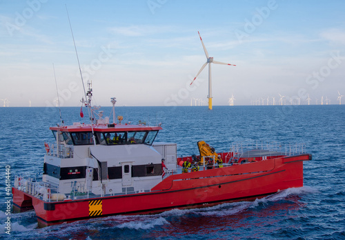 Vászonkép Crew transfer vessel about to start working in wind farm