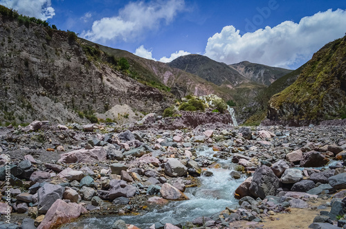 Stock photo of the colored hills and river near Iruya village, Salta, Argentina. Colorful landscape