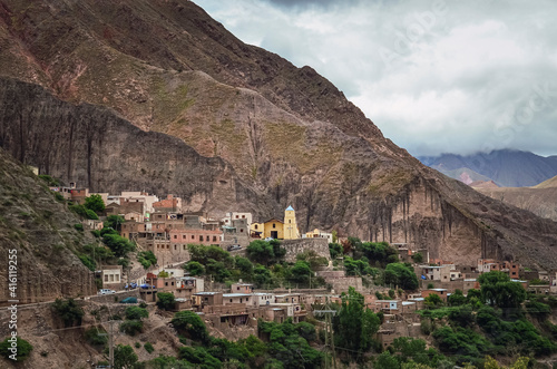 Stock photo of the Iruya village between colored hills and mountains valley. Salta, Argentina. Colorful landscape