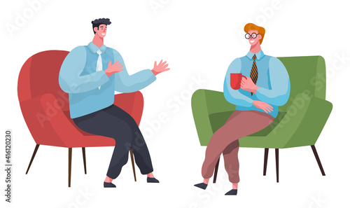Businessmen dressed in formal clothes are sitting on the chairs together, talking, drinking coffee. Office workers discussing matters. Friendly colleagues or friends communicating during the break