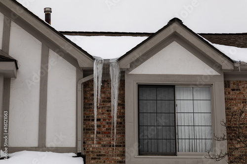Ice Sickle Damming on Roof