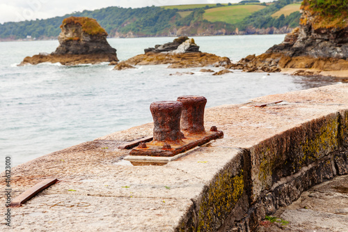 Old Rusty bollards used to anchor boats at Charlestown Harbour, Cornwall