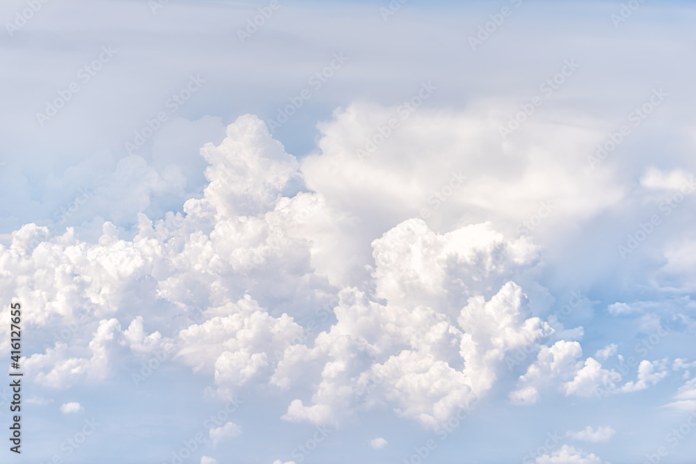 Above high angle view of sky cloudscape with fluffy clouds and bright soft sunny sunlight aerial view of Europe from airplane Above high angle view of sky cloudscape with fluffy clouds and bright soft sunny sunlight aerial view of Europe from airplane