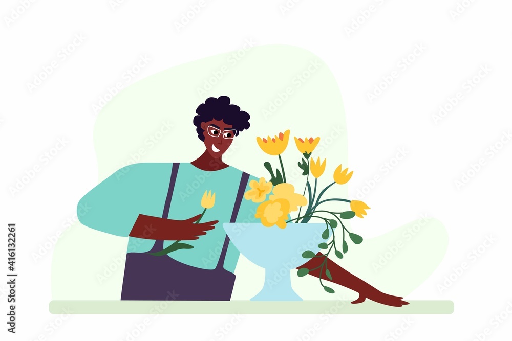 Man compose bouquet on table. Forist shop or store. Man compose bouquet on table. Forist shop or store.