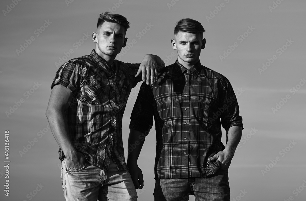 Man twins. Fashion for men. Support and trust, friendship. Twin brothers man, relations. Man twins. Fashion for men. Support and trust, friendship. Twin brothers man, relations.