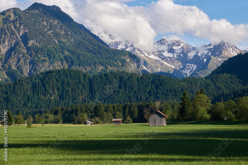 Wallpaper Mural Blick im Abendlicht vom westlichen Talrand über die Weiden und Berge am südlichen Ortsrand von Oberstdorf Torontodigital.ca