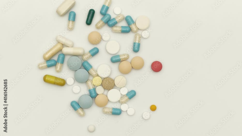 Assorted medicine pills, tablets and capsules view from above Assorted medicine pills, tablets and capsules view from above