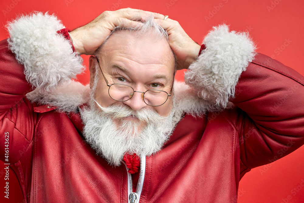 Obraz premium aged caucasian man grabbed head, look at camera looking awesome. isolated red background