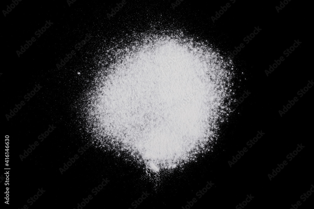 Flour on a black background. Flour on a black background.
