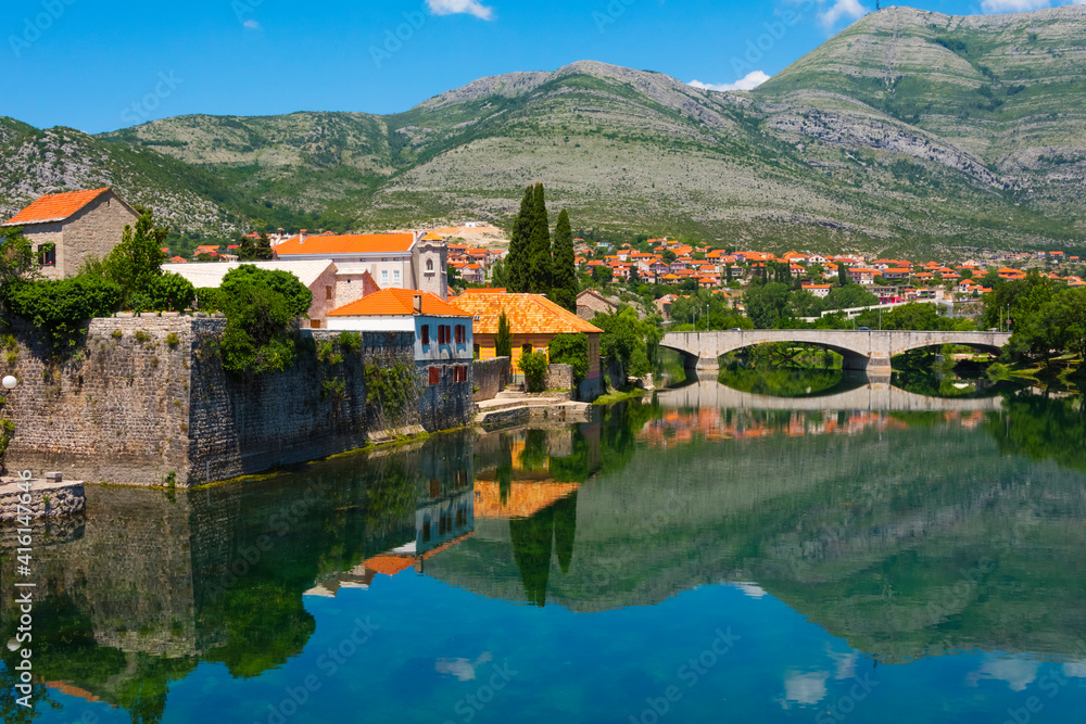 Stone bridge and old town by Trebisnjica River, Trebinje, Bosnia and Herzegovina