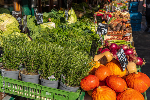 Photography Fresh variety of herb plants, vegetables and fruits in a food farmer's market stall ready for sale