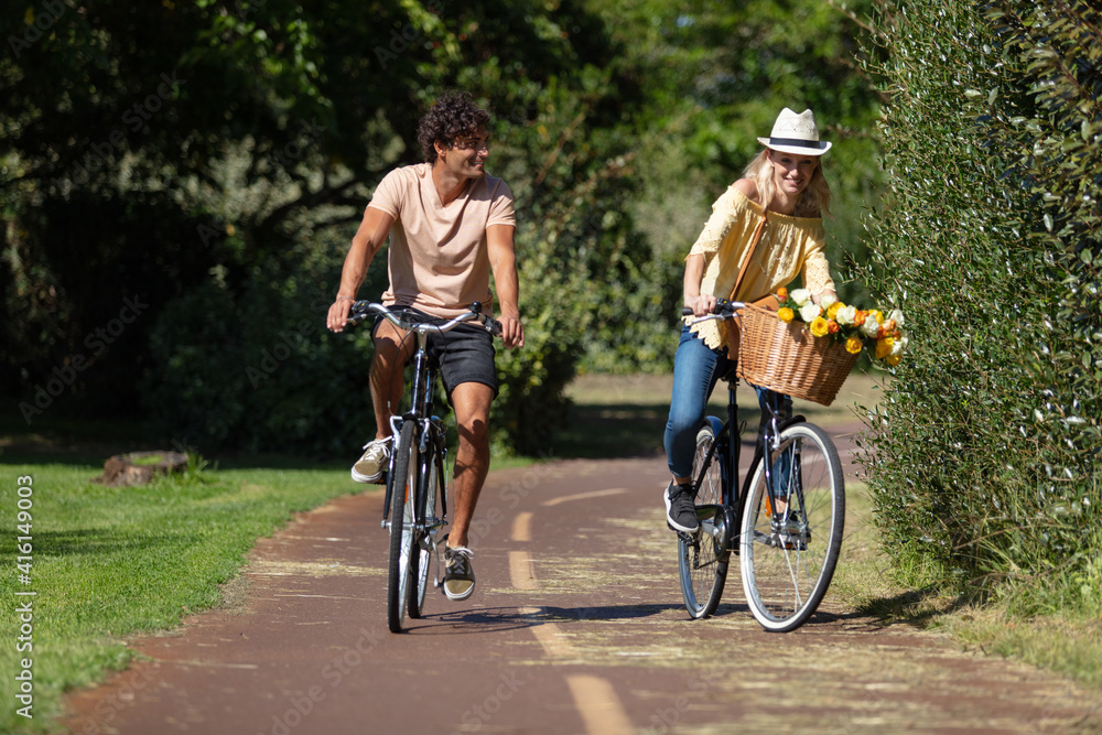 Fototapeta premium young couple having fun in the park