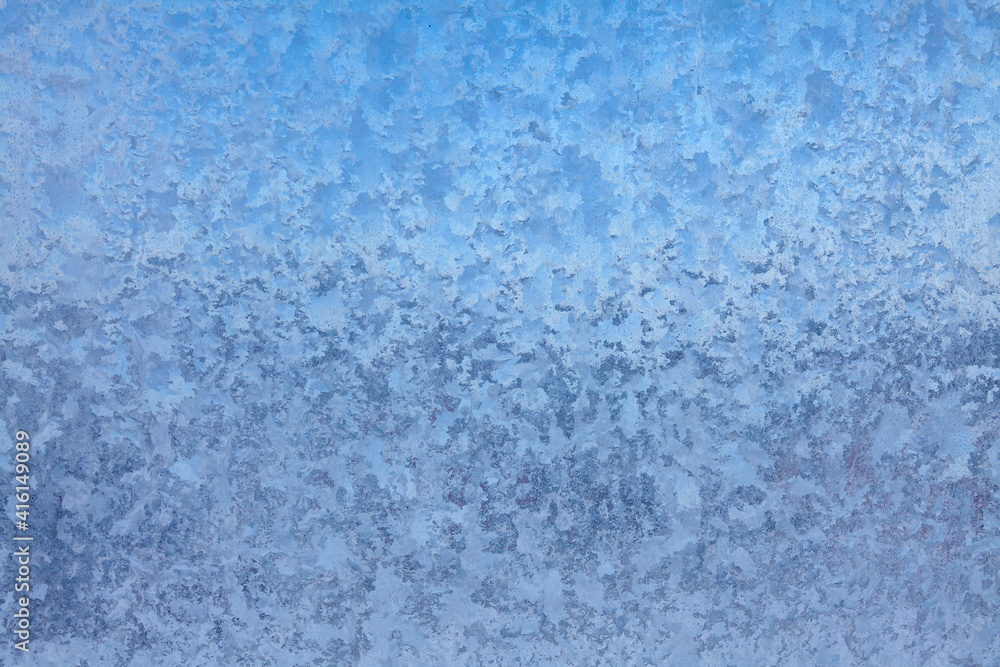 Abstract pattern created by frost on window glass Abstract pattern created by frost on window glass