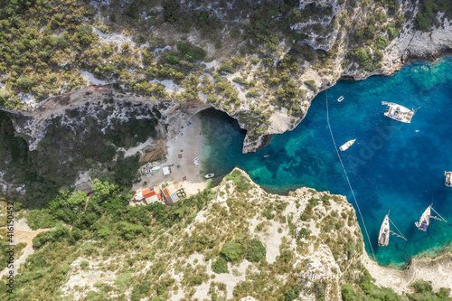Aerial overhead drone shot of Stiniva covert cove beach in Adriatic sea on Vis Island in Croatia in summer