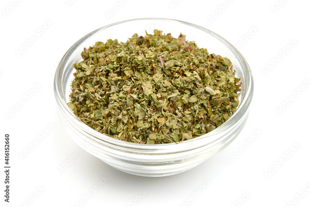 Dried Marjoram spice, isolated on white background. High resolution image Dried Marjoram spice, isolated on white background. High resolution image