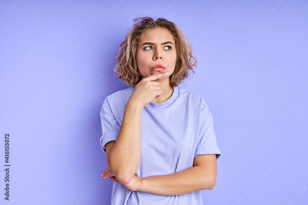 thoughtful female in contemplation, woman in casual wear stands looking at side, having dep thoughts about something, planning thoughtful female in contemplation, woman in casual wear stands looking at side, having dep thoughts about something, planning