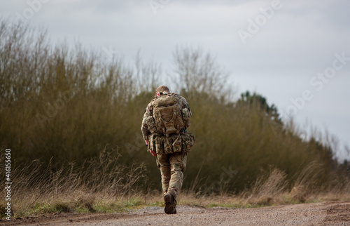 soldier completing an 8 mile tabbing exercise with fully loaded bergen