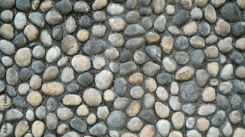 Exterior wall texture of a building with lots of gravel Exterior wall texture of a building with lots of gravel