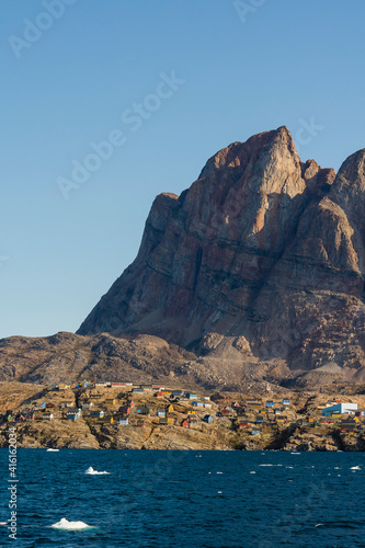 Greenland. Uummannaq. Heart-shaped Uummannaq mountain towers over the town.