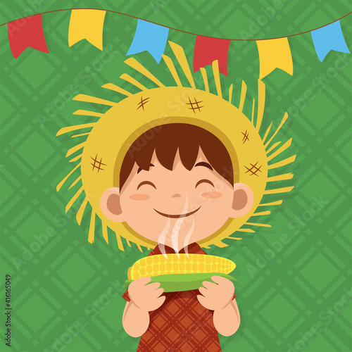 Boy eating boiled corn in junina party