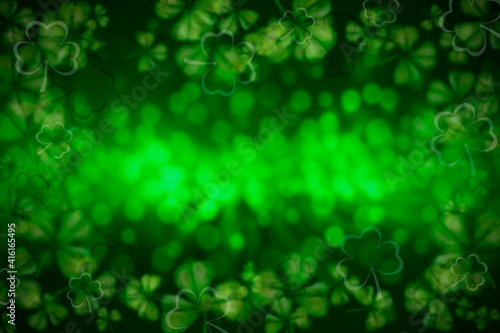 Blurred background with fern leaves. St.Patrick 's Day
