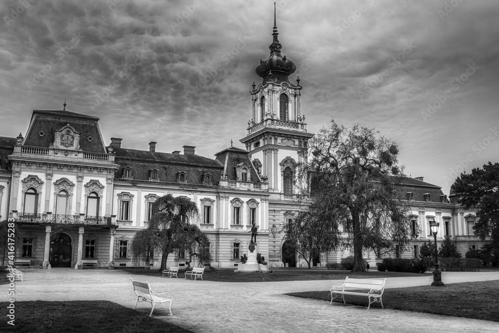 The romantic and gorgeous exterior and the park of the Festetics Palace in black and white in Keszthely, Hungary