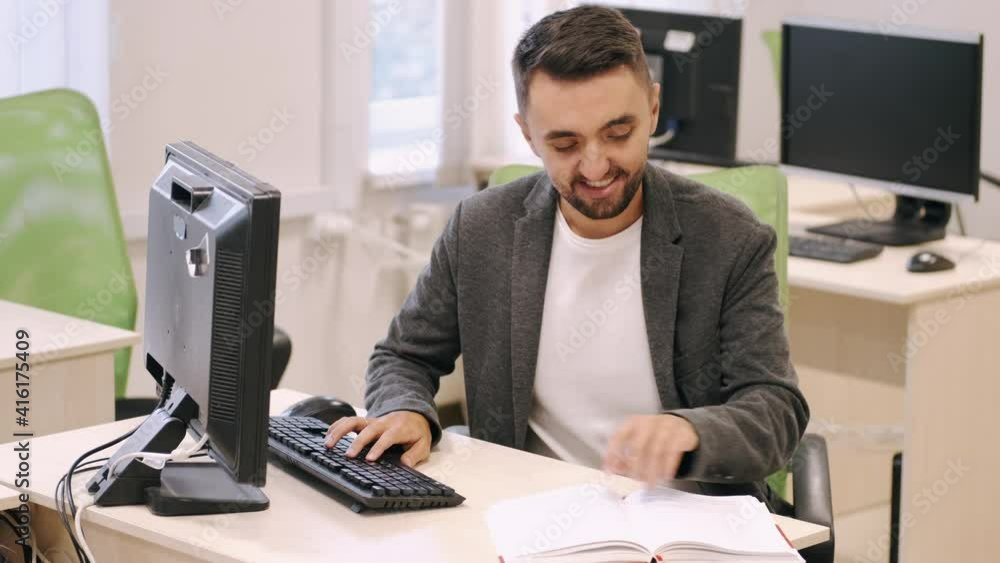 Focused business man entrepreneur typing on keyboard and doing research. Busy worker freelancer working on computer at office. Focused business man entrepreneur typing on keyboard and doing research. Busy worker freelancer working on computer at office.