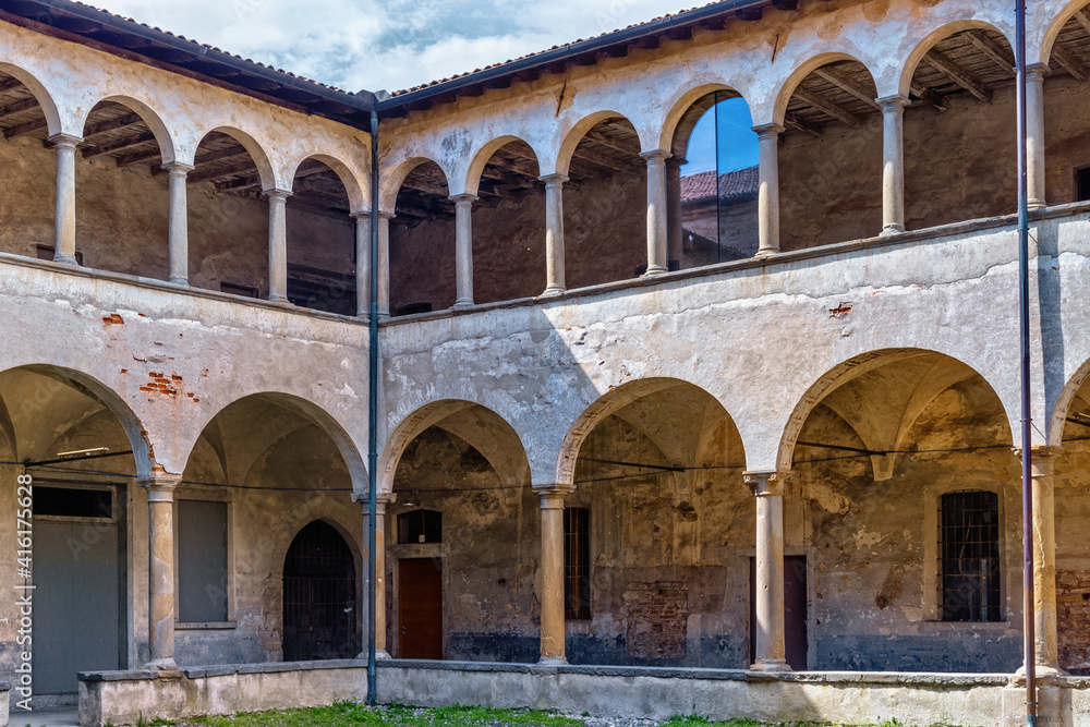 Old arcade courtyard of the former Saint Augustin monastery (Ex monastero di Sant'Agostino), now is the University of Bergamo. Italy.