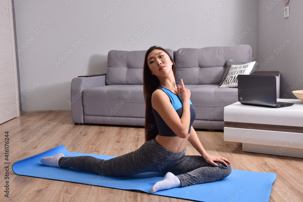 Young asian woman making online training yoga Young asian woman making online training yoga
