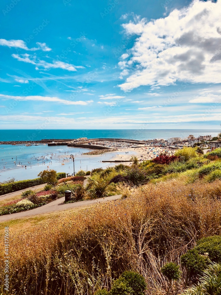 Beautiful View over Lyme Regis Cobb and Beach From Langmoor and Lister Gardens, Dorset Beautiful View over Lyme Regis Cobb and Beach From Langmoor and Lister Gardens, Dorset