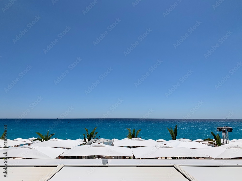 Obraz premium beach chairs and umbrellas