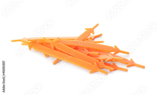 Orange silicone shoe laces on white background photo