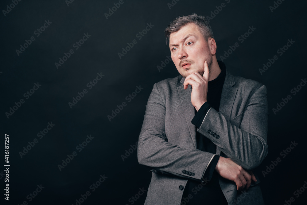 Doubtful pensive business man Doubtful pensive business man