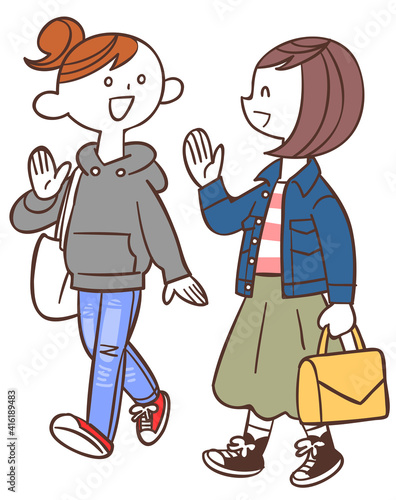 会話しながら歩く若い女性たち
