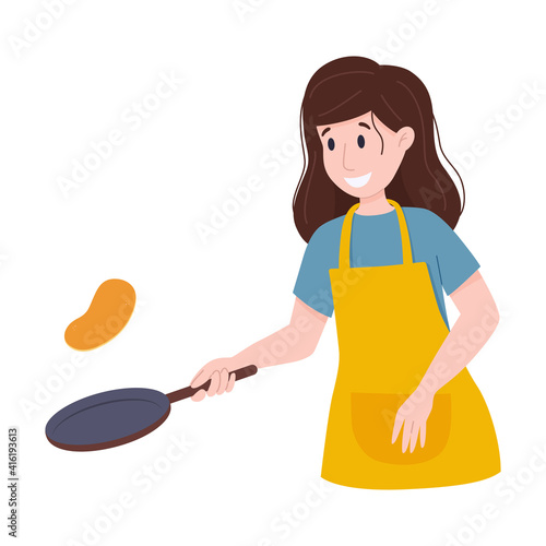 Woman fries pancakes in frying pan. Flips pancake in the air.