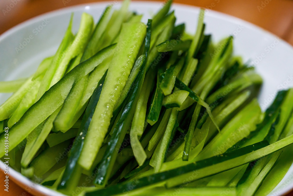 A plate of Chinese cold dishes, cold cucumber shredded