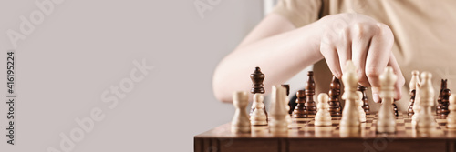 Fotografi Banner with Faceless boy develops game strategy
