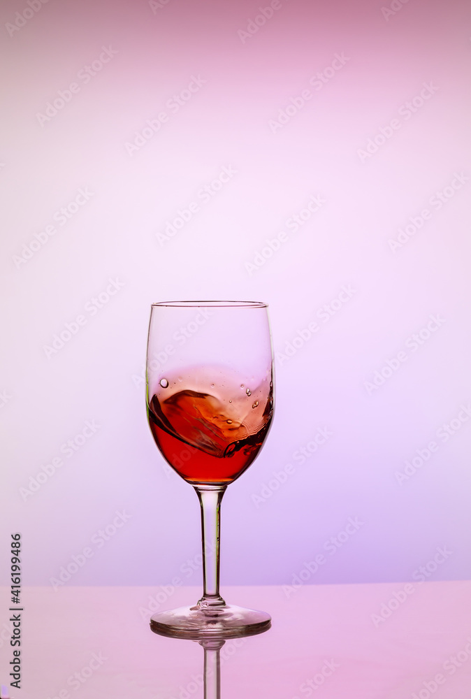 Glass of sweet red wine on white background. Glass of sweet red wine on white background.