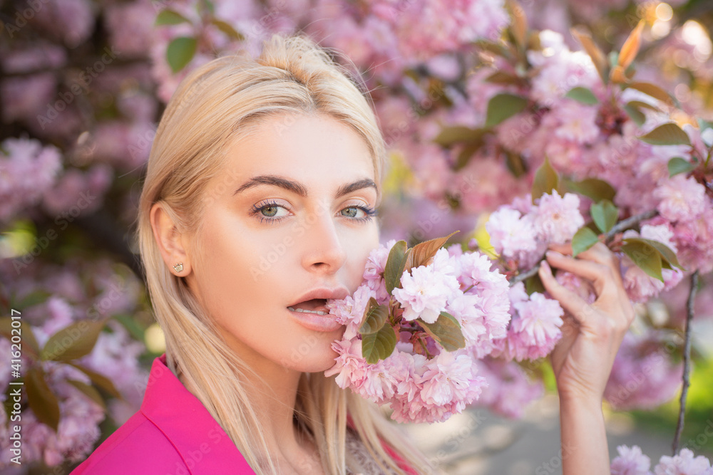 Fototapeta premium Spring girl fashion. The tongue. Blossom woman.