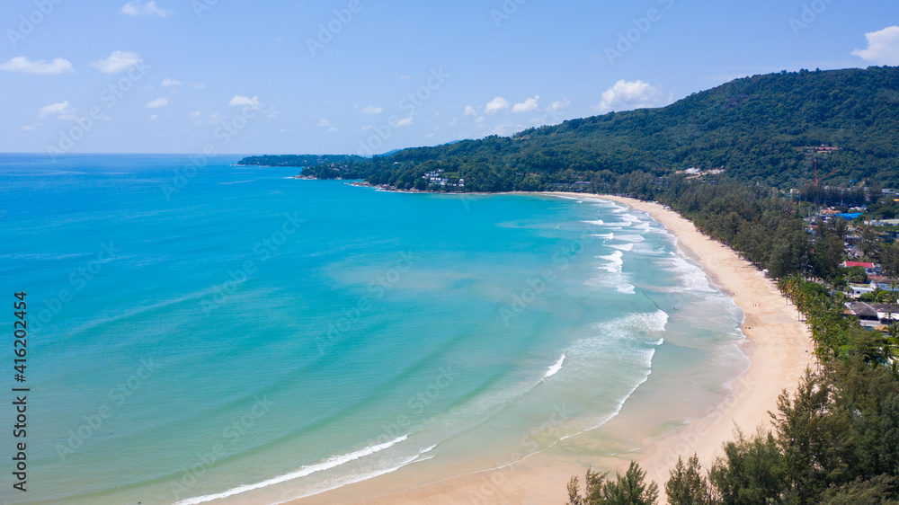 Aerial: Kamala beach is a beautiful white-sand beach which is located at Phuket, Thailand