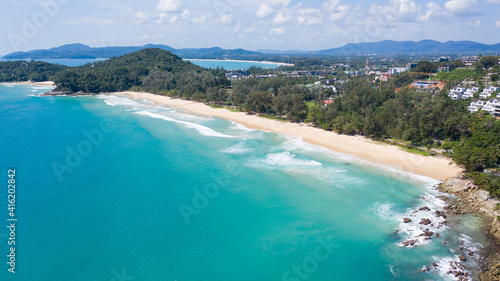 Fototapeta Naklejka Na Ścianę i Meble -  Aerial: Surin beach is a beautiful white-sand beach which is located at Phuket, Thailand